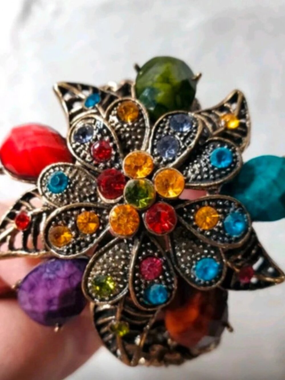 Statement jeweled encrusted bracelet in brass tone